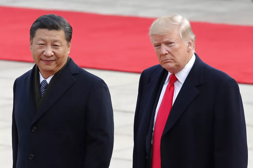 Donald Trump e Xi Jinping em uma cerimônia oficial