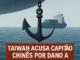 Âncora de navio em destaque sobre o mar, com cargueiro ao fundo. Texto: 'Taiwan acusa capitão chinês por dano a cabo submarino