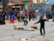 Manifestantes e presença policial durante protesto em Luanda, Angola