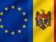 Bandeiras da União Europeia e da Moldávia lado a lado, simbolizando cooperação e integração entre os dois.
