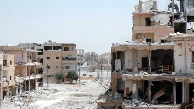 c79f2e9e-34c2-4762-af79-8c1c0fe76059 Bairro destruído em Raqqa após bombardeios durante a guerra civil síria