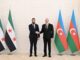 Presidente interino da Síria, Ahmad al-Sharaa, cumprimenta o presidente do Azerbaijão, Ilham Aliyev, durante encontro oficial em julho de 2025.